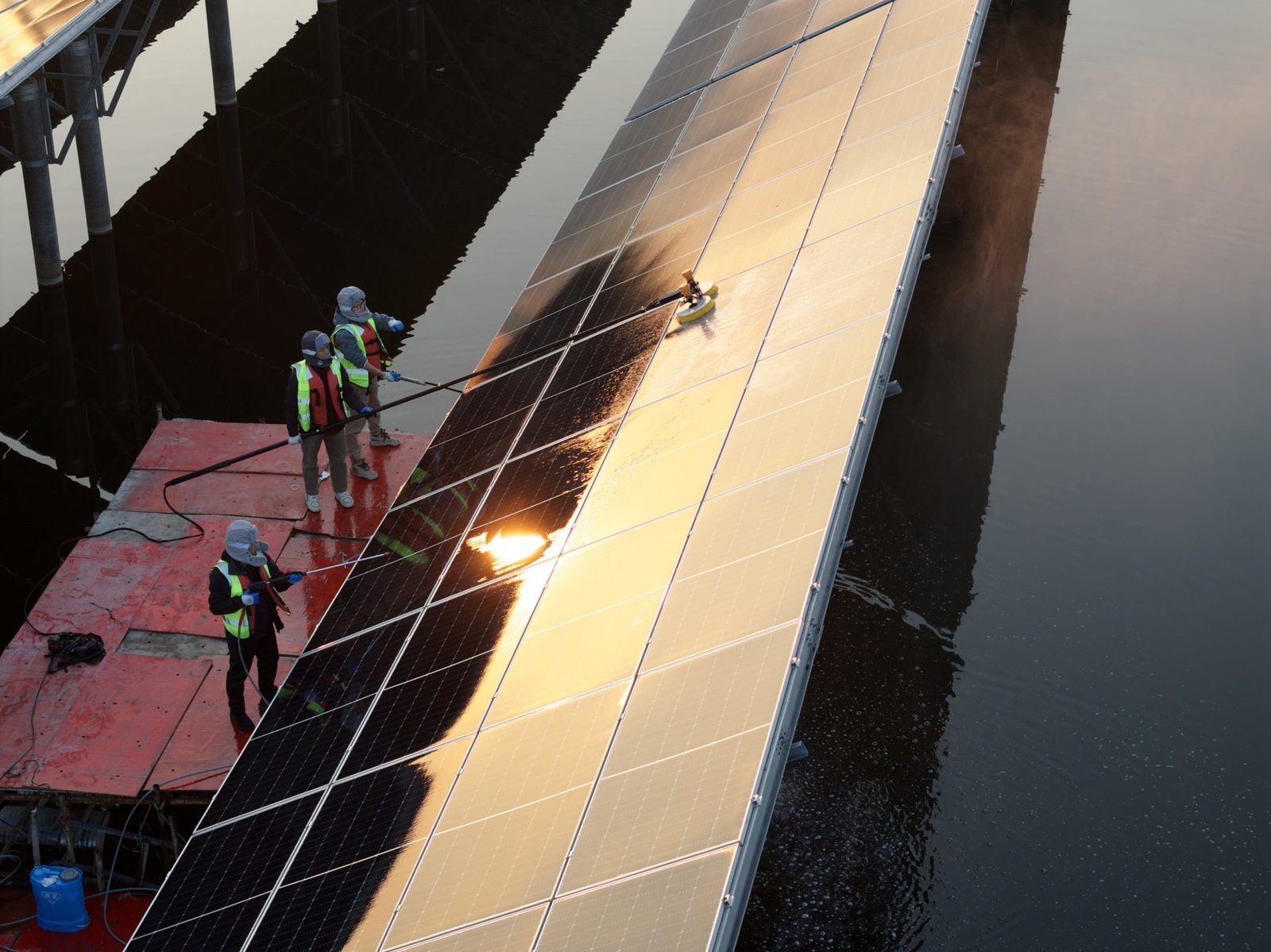 Water-surface PV plant power-boost coating
